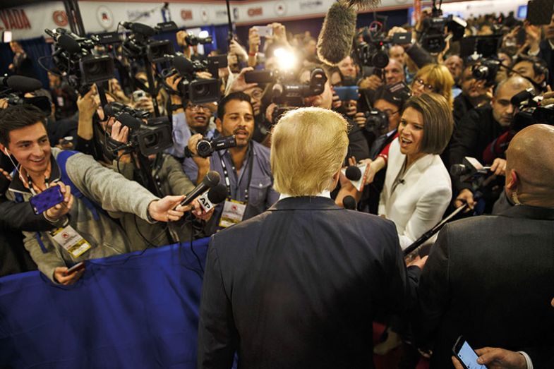 Trump surrounded by reporters Trump surrounded by reporters